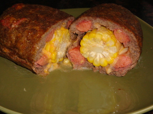 The Cornhole Corn on the cob wrapped in hickory bacon with two hot dogs and two Colby-Jack cheese sticks wrapped in ground beef. (submitted by Joe T. and EOB)
