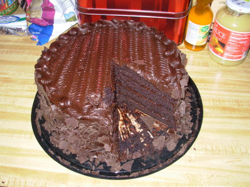 In reference to this cake, I sent a text to my sister earlier today telling her to tell Mom to buy us chocolate cake. I didn’t think she would do it. But she did. This is Costco’s All American Chocolate Cake. And it’s as delicious as it looks for all of $16.99. Just goes to show you that it never hurts to ask.